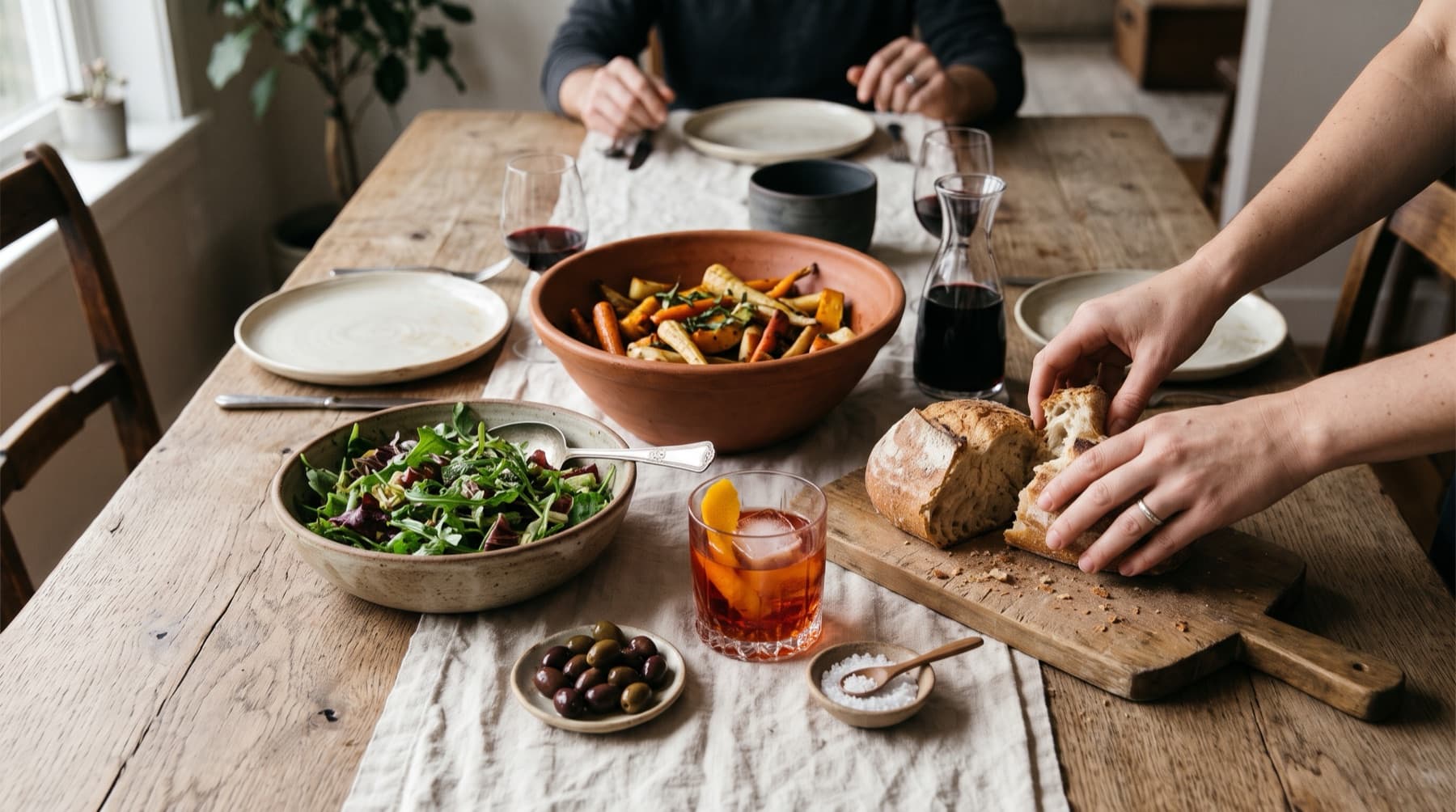 A long table set for dinner among friends
